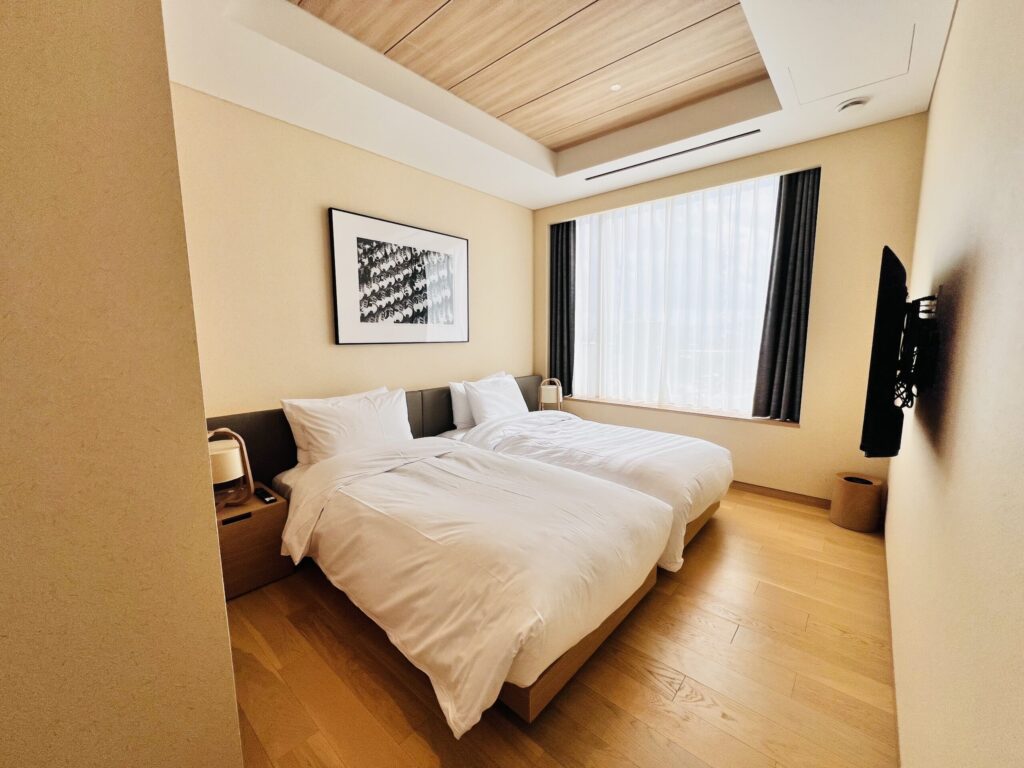 雪ニセコ 2ベッドルームスイートの寝室 Setsu Niseko twin bedroom